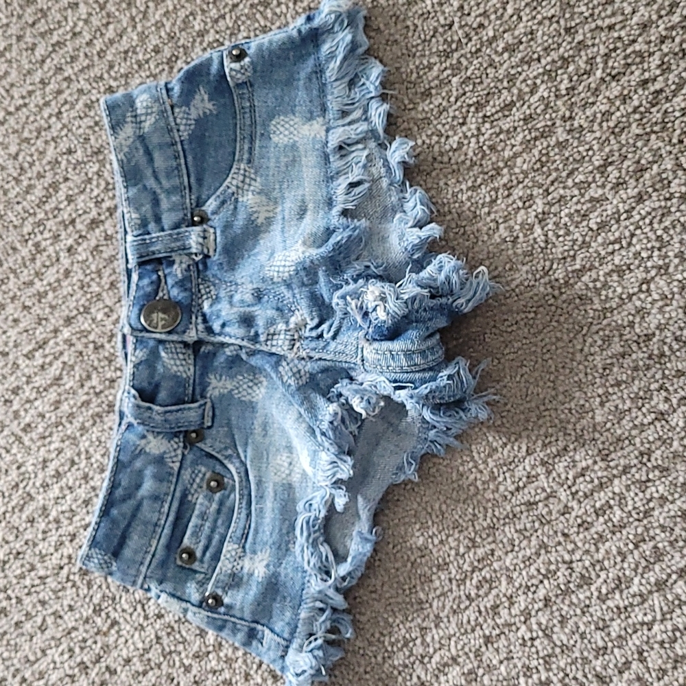 Short shorts with pineapples by designer Playsix